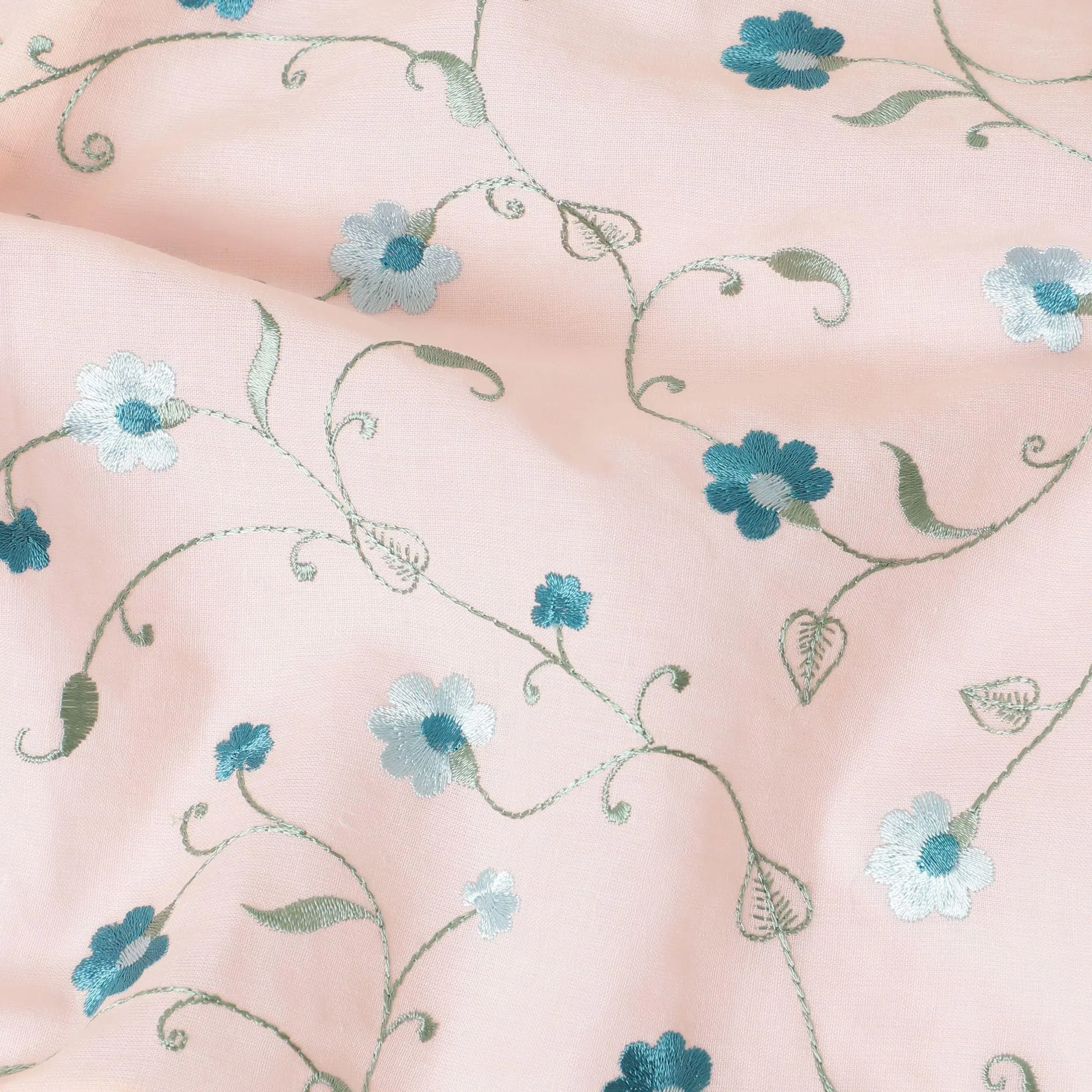 Peach cotton voile fabric with sapphire blue, olive green and powder blue embroidery in floral design-D11083